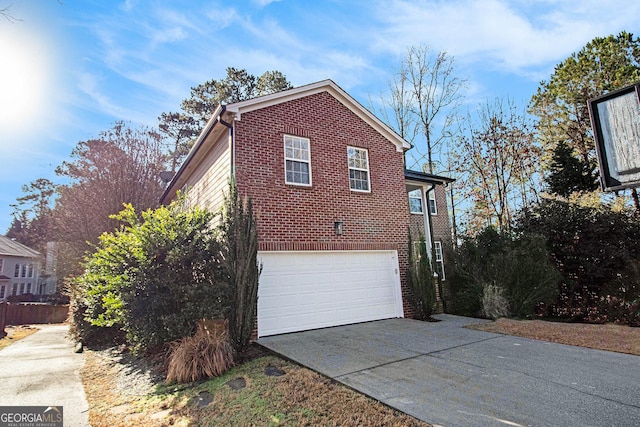 view of property exterior featuring a garage