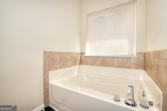 bathroom with a tub