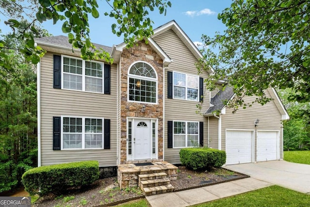 view of front of property with a garage