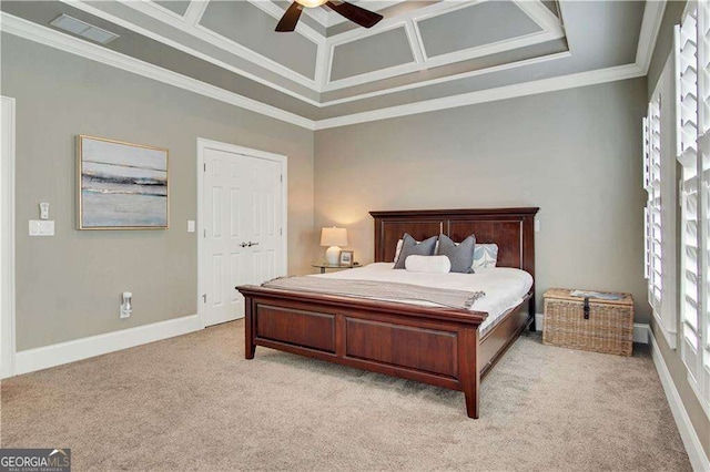 bedroom with ceiling fan, ornamental molding, coffered ceiling, and light carpet