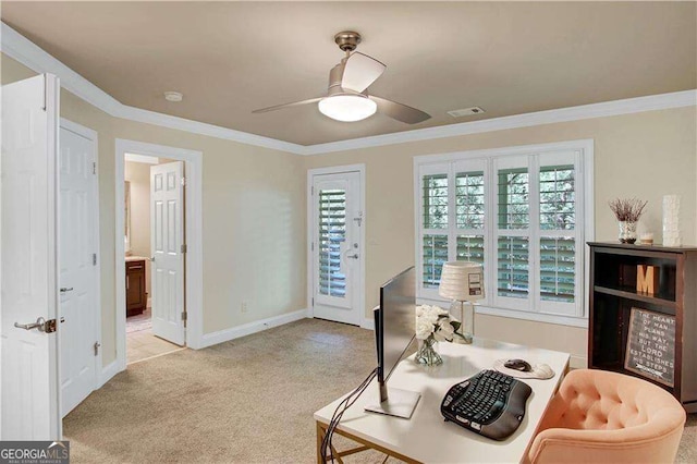 living area with crown molding, ceiling fan, and light carpet