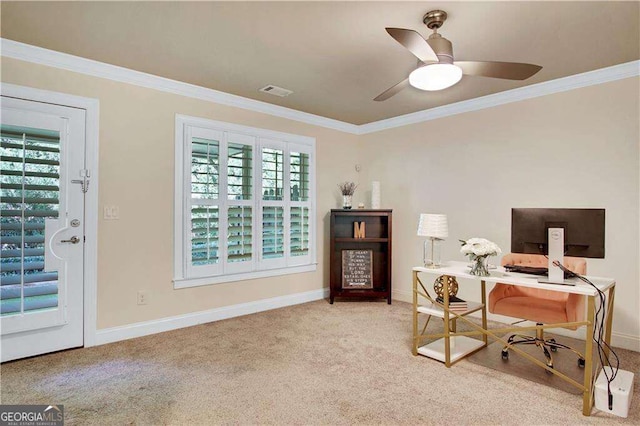 office space with crown molding, light colored carpet, and ceiling fan