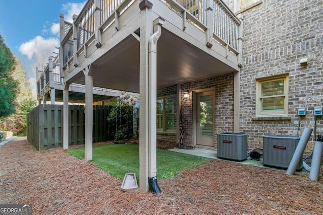 view of patio / terrace with a balcony and central AC unit