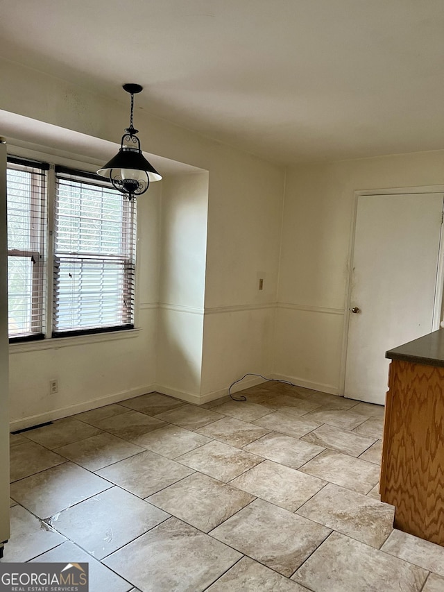 view of unfurnished dining area