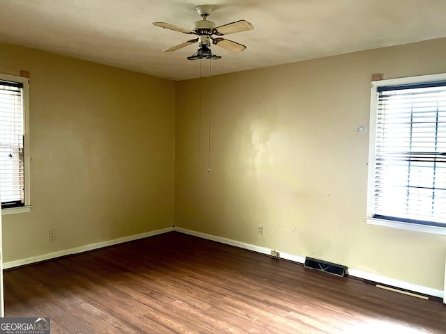 unfurnished room featuring ceiling fan and hardwood / wood-style floors