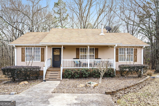 view of front of property featuring covered porch