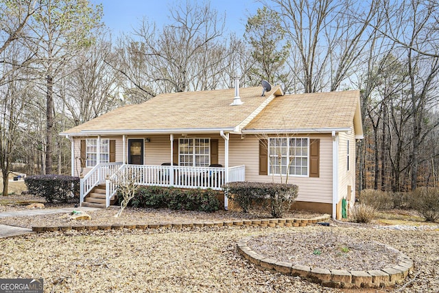 view of front of home featuring covered porch