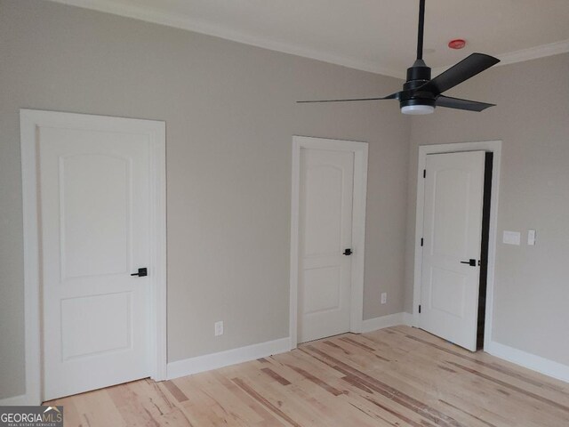 unfurnished bedroom featuring ceiling fan, ornamental molding, and light hardwood / wood-style flooring