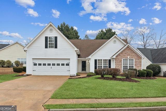 front of property featuring a garage and a front lawn