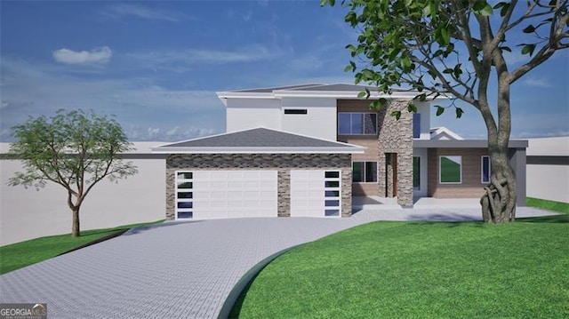 view of front of house featuring a garage and a front yard