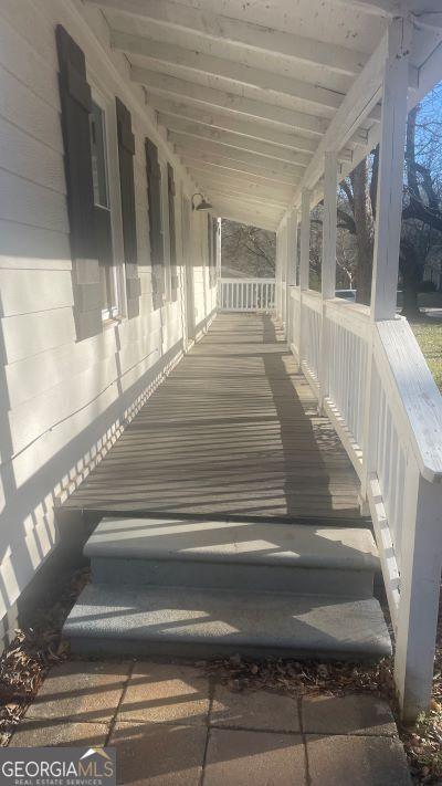 exterior space featuring covered porch