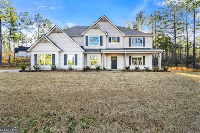 craftsman-style house featuring a front lawn