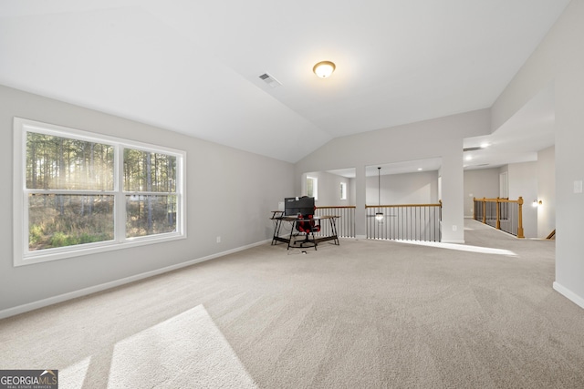 office space featuring vaulted ceiling and carpet floors