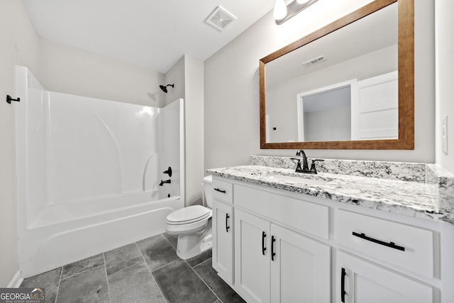 full bathroom with shower / tub combination, vanity, and toilet