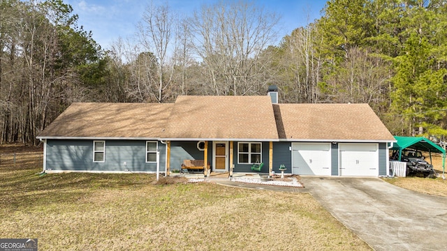 single story home with a garage and a front lawn