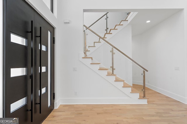 foyer entrance featuring light hardwood / wood-style flooring