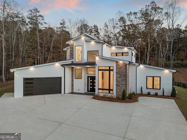 modern home featuring a garage