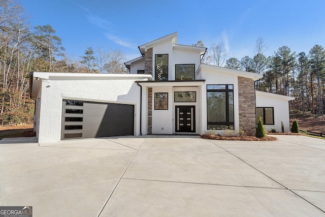 contemporary home with a garage