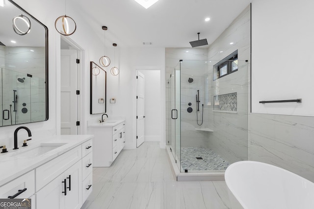 bathroom featuring vanity and a shower with shower door