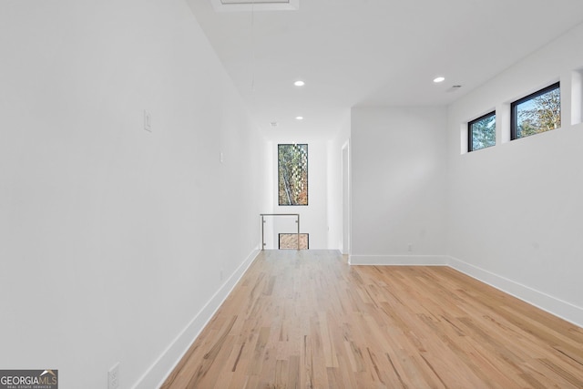 unfurnished living room with light hardwood / wood-style floors