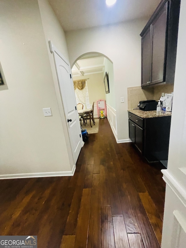 corridor featuring dark wood-type flooring