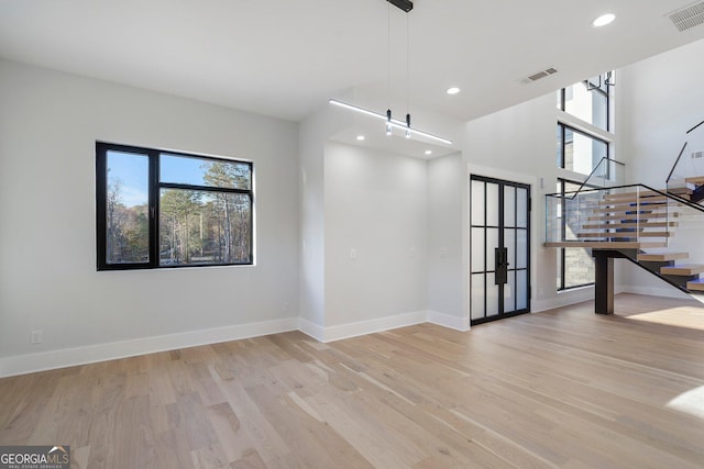 unfurnished room featuring light hardwood / wood-style flooring