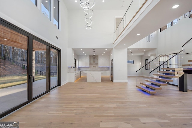 foyer with light hardwood / wood-style floors