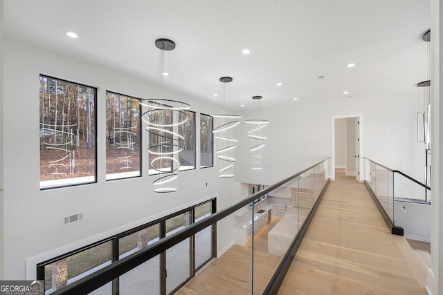 hallway featuring light hardwood / wood-style flooring