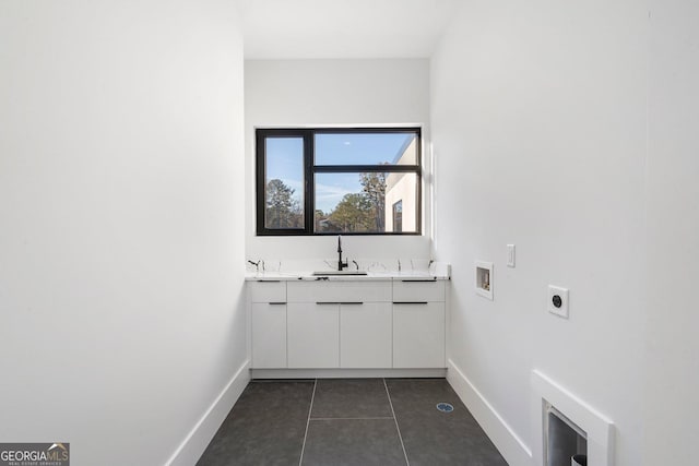 bathroom with tile patterned flooring and sink