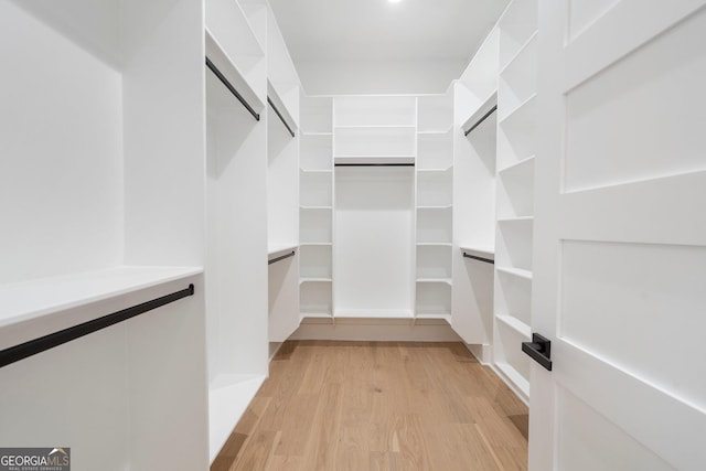 walk in closet featuring light wood-type flooring