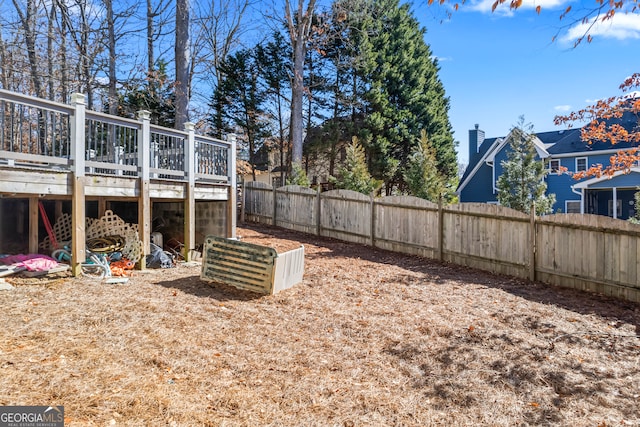 view of yard featuring a deck