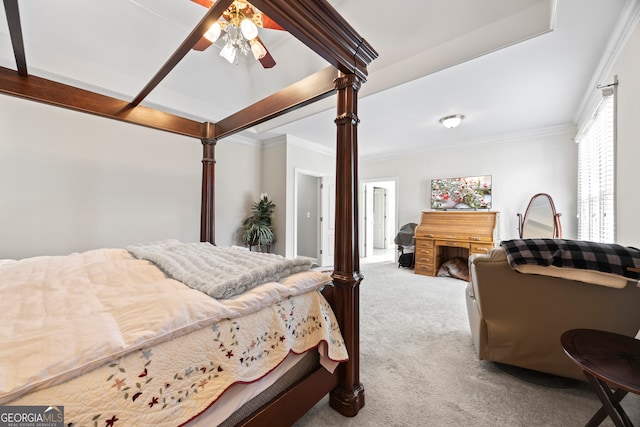 carpeted bedroom with crown molding and ceiling fan