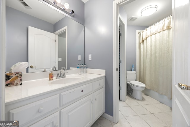 bathroom featuring vanity, a shower with curtain, tile patterned floors, and toilet