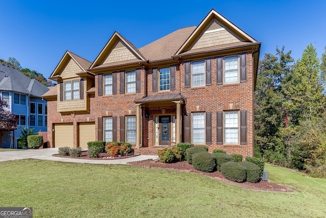 view of front of house featuring a garage and a front lawn