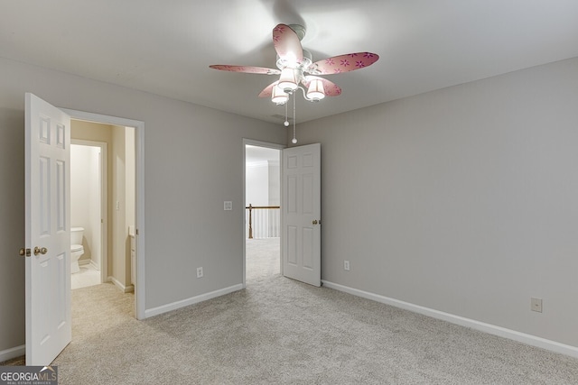 unfurnished bedroom with light carpet and ceiling fan