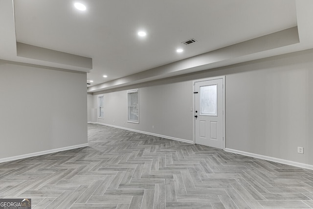 basement with light parquet flooring