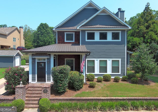 view of front facade featuring a front lawn