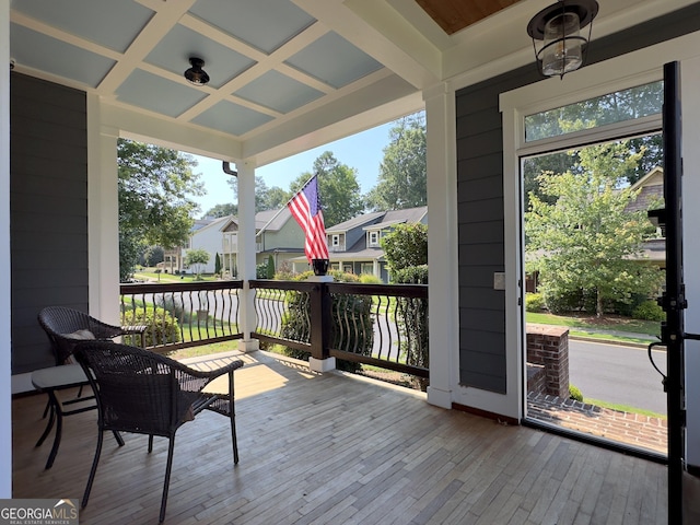 10 Plum Blossom Ln, Hampton, GA 30228 - wooden terrace with covered porch and a residential view