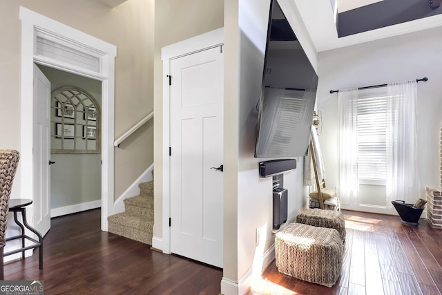 10 Plum Blossom Ln, Hampton, GA 30228 - living area with wood finished floors, stairway, and baseboards