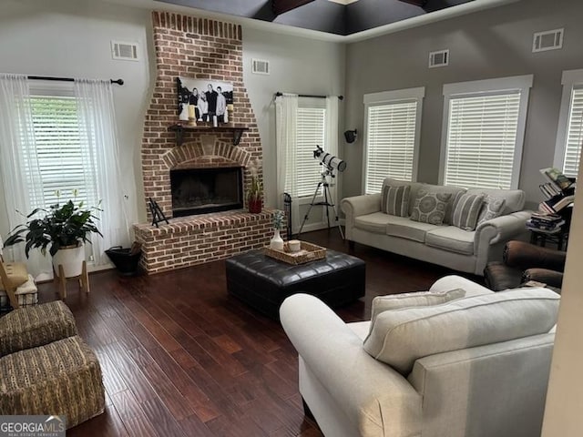 10 Plum Blossom Ln, Hampton, GA 30228 - living area featuring wood finished floors and a fireplace