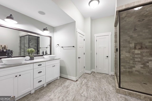 bathroom with vanity and walk in shower