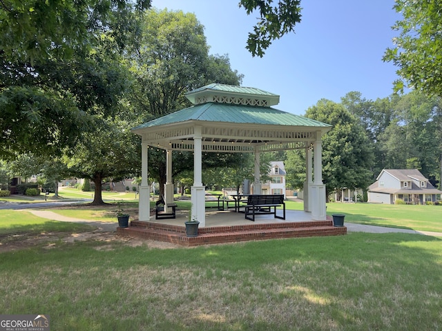 view of home's community featuring a gazebo and a lawn