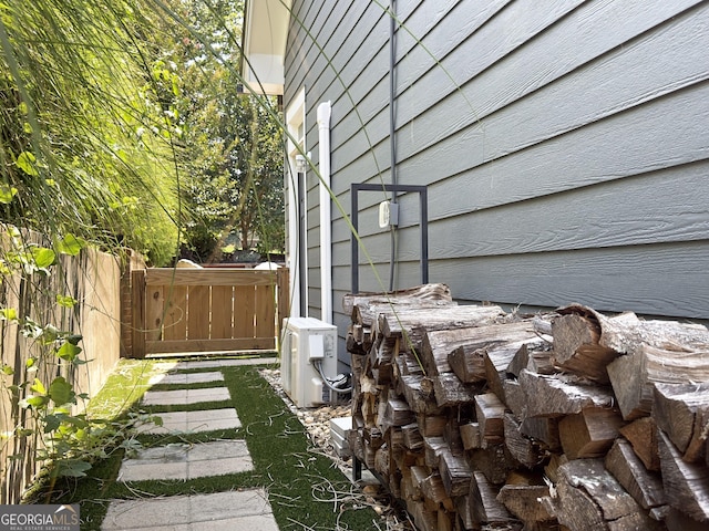 10 Plum Blossom Ln, Hampton, GA 30228 - view of yard featuring fence and ac unit