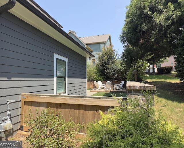 exterior space featuring a fire pit and a patio area