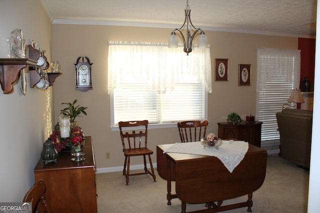 dining space with a notable chandelier, crown molding, plenty of natural light, and light colored carpet