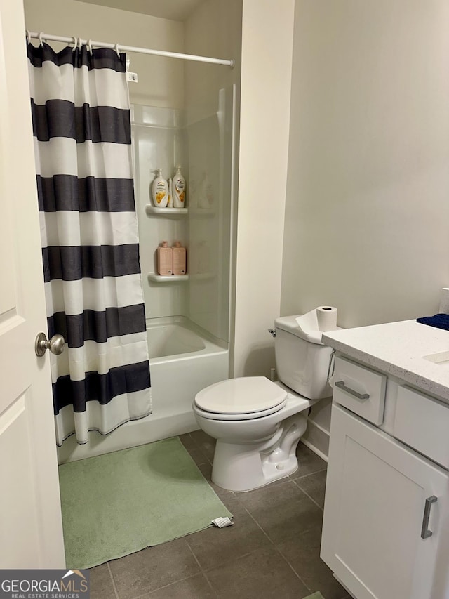 full bathroom with shower / bath combination with curtain, tile patterned floors, toilet, and vanity