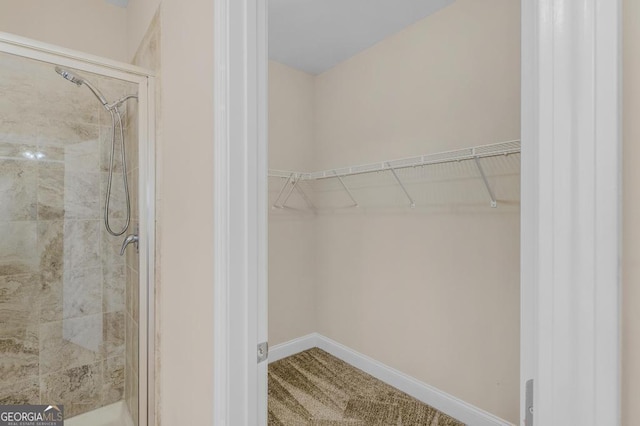 bathroom featuring tiled shower