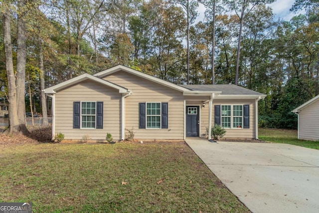 ranch-style house with a front yard