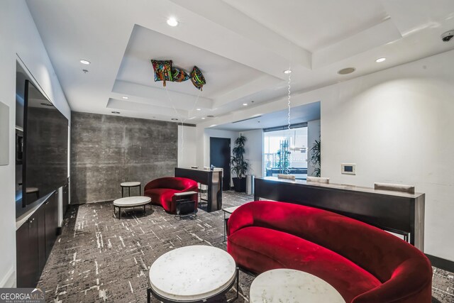 recreation room featuring billiards and a tray ceiling