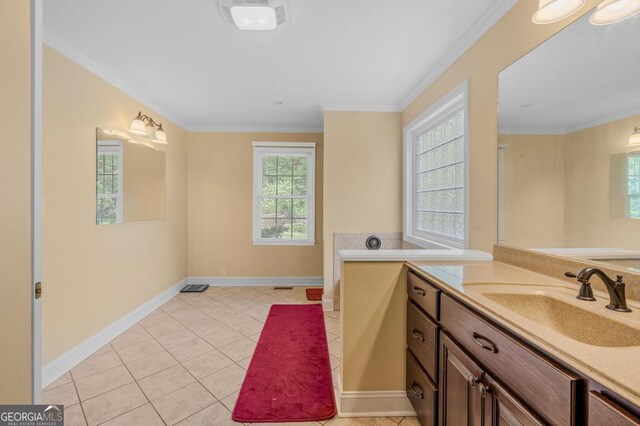 bathroom with tile patterned floors, ornamental molding, and vanity